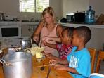 Volunteer with children in Belize