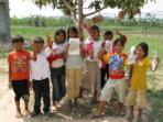 Volunteer with children in Cambodia
