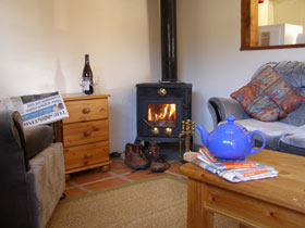 Otter Cottage has a woodburning stove - free first basket of firewood then refills 'at cost'