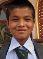 Sujan in his new school uniform