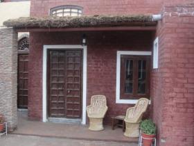 Thatched porch in fromt of bedroom