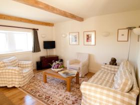Relax in the cosy sitting room