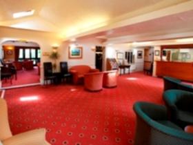Reception desk and lounge, welcoming you in.