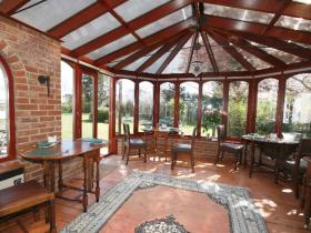 The sunny breakfast room at Harvest House