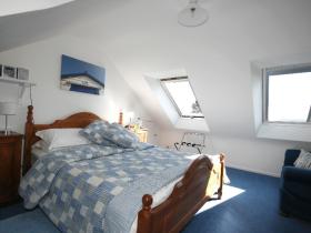 The kingsize bedroom of the Attic Suite at Harvest House