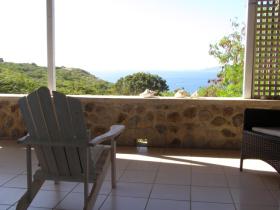 Relax on covered terrace + sea view