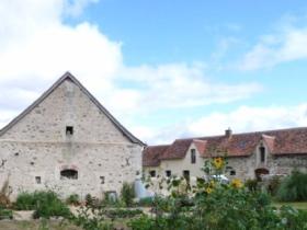 View of courtyard from the chicken run vegetable plot