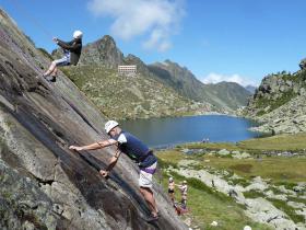 Rock climbing above the Lac de Glere