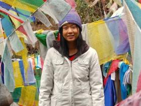 Prayer flags on every mountain pass.