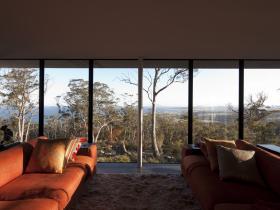 Beautiful orange (feet up) couches