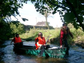 canoeing down the river