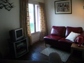 Comfortable living space at les Limornieres including dining table & chairs for 4