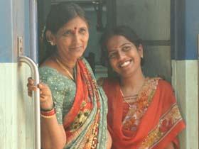 Mother and daughter on a local train