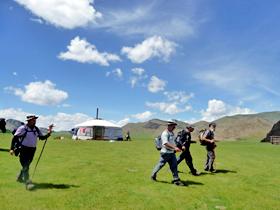 Walking past a Mongolian ger at the Eight Lakes