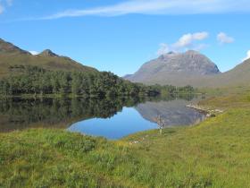 Torridon hills on a stunning, flat-calm day in Scotland