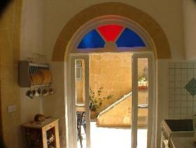 Kitchen leading onto courtyard