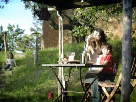 Relax outside the house with a glass of Chianti!