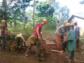 Volunteers helping the local builders