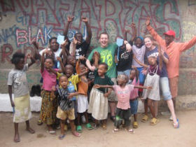 Volunteer with children in Mombasa, Kenya