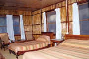 Lodge bedroom, Jungle lodge and camp in Nepal