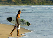 Surfing on beach at Costa Rica accommodation