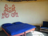 Bedroom in community village accommodation, South Africa