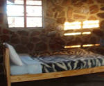 Bedroom in community accommodation, Swaziland