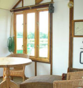 Sitting area, houseboat in rural devon