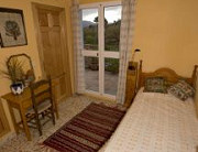 Bedroom at rural guesthouse in Malaga, Spain