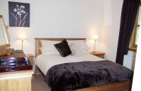 Bedroom, Luxury self catering cottages near Loch Ness