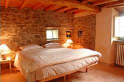 Bedroom at Tuscany holiday apartments