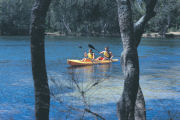 Kayaking on the lake, Lake shore resort in Australia