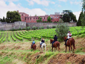 riding past the castle of Brolio in the Chianti region