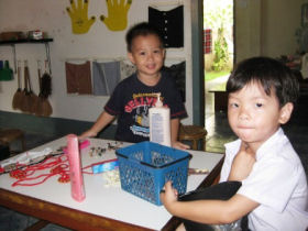 Volunteer with children in Laos