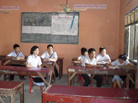 Volunteer with children in Laos