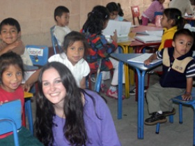 Volunteer with children in Guatemala
