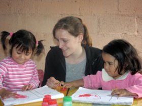 Volunteer with children in Guatemala