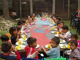 Volunteer with children in Guatemala