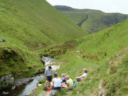 Walking by a stream on Ireland walking holiday