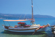 Boat near Beach club in Greece