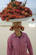 Woman with lychees, Cambodia photography holiday