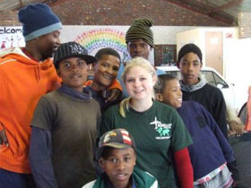Volunteer with children in South Africa
