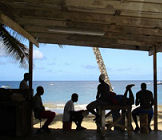 Tobago beach accommodation, locals on the beach