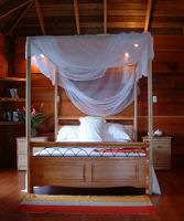 Tobago beach accommodation, four-poster bed