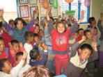 Volunteer with children in Nepal