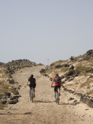Cyclists on Isla de los Lobos, Fuerteventura. Photo by Nick Haslam