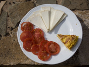 Majorero cheese and tomatoes on Fuerteventura. Photo by Nick Haslam
