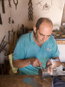 Tinsmith at Ecomuseo de La Alcogida, Fuerteventura. Photo by Nick Haslam