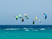 Kitesurfing on Fuerteventura. Photo by Rene Egli Windsurfing And Kitesurfing Pro Center