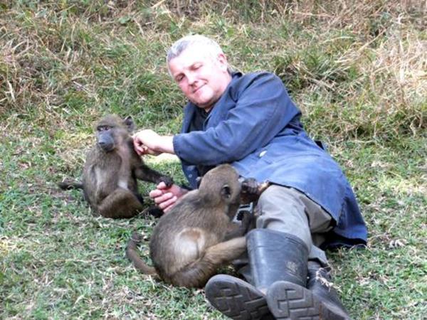 Family volunteering with monkeys in South Africa